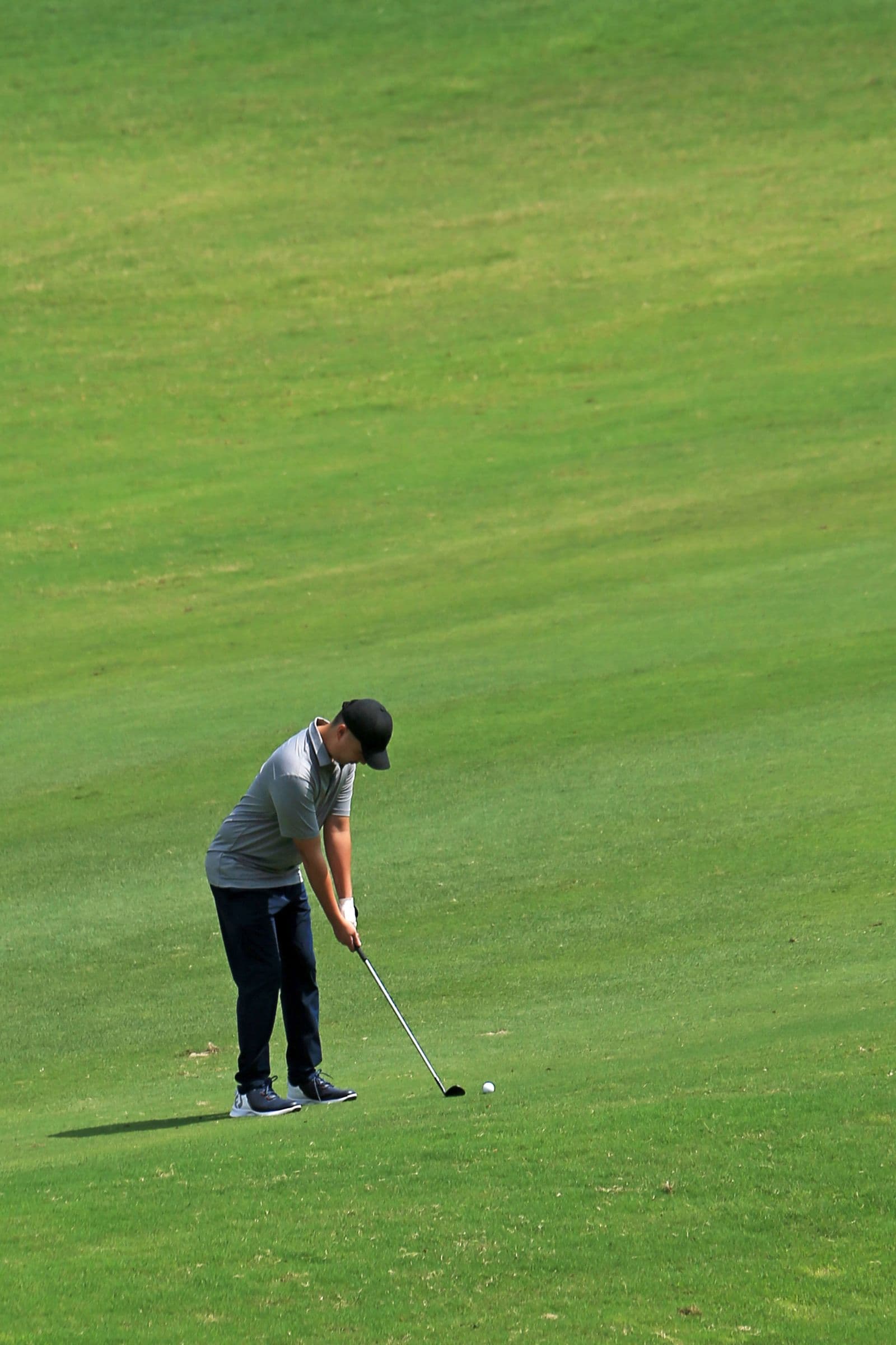 A golfer focused on the next shot